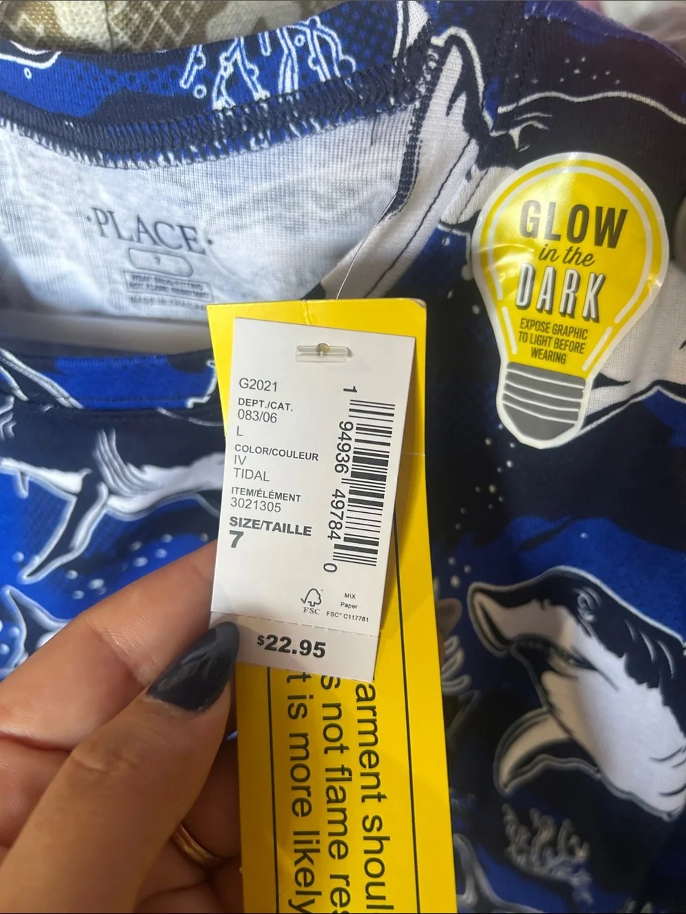 The Children's Place Navy Blue & White Shark Glow-in-the-Dark Pajama set.